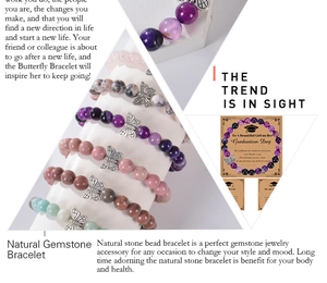 Detail view of 8mm natural purple agate beaded bracelets with elegant butterfly charms