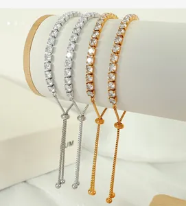 Detail of adjustable gold and silver tennis bracelets with cubic zirconia on jewelry roll