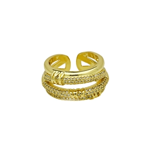 Close-up of gold-plated double-layer open ring with pavé-set shimmering zircon stones