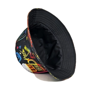 Detail shot of black bucket hat with neon beer graffiti and street style pattern