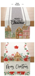 Detail of Christmas table runners with gingerbread houses and Merry Christmas print