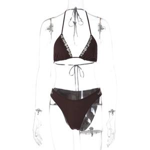 Detail view of dark brown bikini top with silver metallic button embellishments