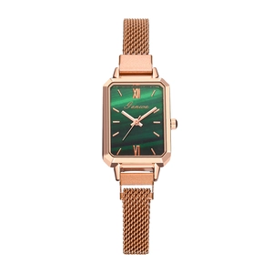 Rose gold rectangular watch with peacock green dial and Milanese mesh steel strap
