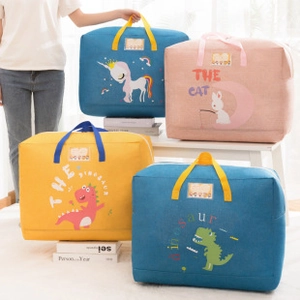 Detail of multi-colored large travel cosmetic bags with cute cartoon patterns