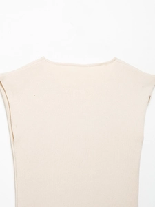 Detail shot of the fine-knit texture and smooth neckline on this beige sleeveless top