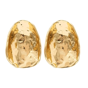 Minimalist irregular oval metal stud earrings with golden hammered texture on white background