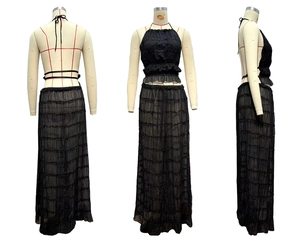 Detail view of black backless halter top and tiered ruffle mesh skirt set for women