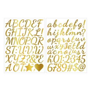 Macro view of gold metallic cursive alphabet and number stickers for DIY water bottles