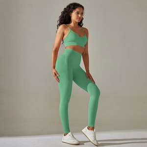 Detail view of mint green seamless knit yoga set with high waist compression leggings