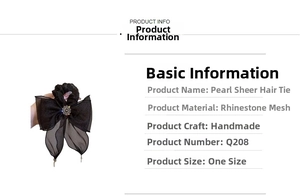 Detail of handmade pearl gauze hair scrunchie with black bow and rhinestone center piece