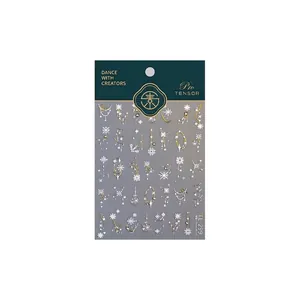 Winter snowflake and starburst nail art stickers with elegant jewel tassel patterns