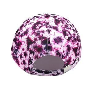 Detail of purple tie-dye baseball cap featuring an adjustable silver metal buckle back