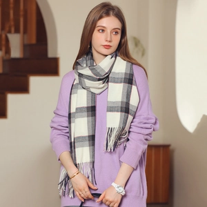 Women's cashmere-like scarf with beige and grey plaid pattern and tassel details