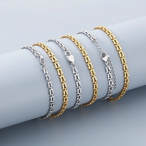 Close-up of H-shaped chain bracelets with lobster clasp and adjustable links