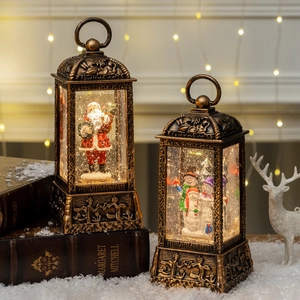 Vintage bronze Christmas lanterns with Santa and Snowman scenes and warm LED glow