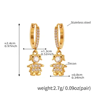 Detailed view of gold plated stainless steel girl pendant earrings with white zircon