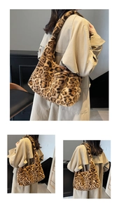Detailed view of plush leopard print shoulder bag featuring soft faux fur and wide strap