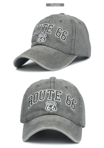 Detailed embroidery of Route 66 shield on a vintage washed grey cotton baseball cap