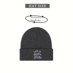 Size chart for dark grey knit beanie showing 56-58cm head circumference measurement