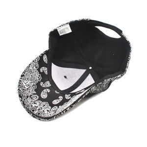Paisley pattern baseball cap in black and white featuring cotton acrylic blend fabric