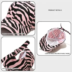 Pink and black zebra print baseball cap with adjustable metal buckle and breathable lining