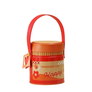Cartoon red festive tin gift box with leather handle and heart-shaped love tag