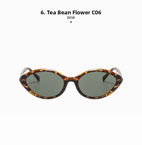 Detail of tortoiseshell cat eye sunglasses with C06 DEMI frame and dark green lenses
