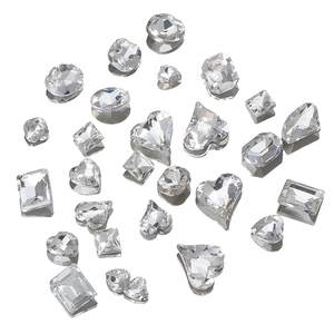 Sparkling assorted clear crystals in heart, square, and oval shapes for nail art DIY