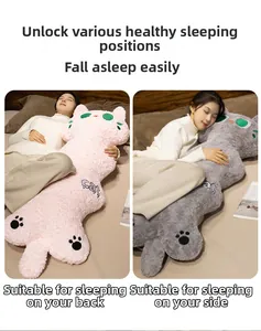 Detail view of long cat plush pillows for back support and side sleeping in pink and grey