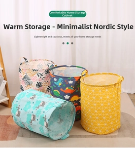 Detailed view of four assorted foldable canvas storage bins with various decorative patterns