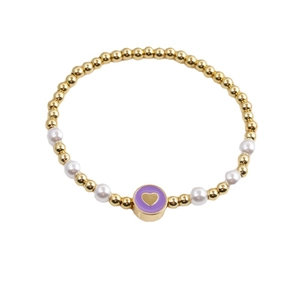 Chic beaded stretch bracelet with gold beads, pearls, and purple heart pendant on white background