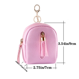 Pink mini backpack coin purse in PU leather with size labels 9x7x3.5cm and tassel