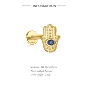 Detailed view of S925 sterling silver golden Hamsa earring with blue AAAAA zircon stone
