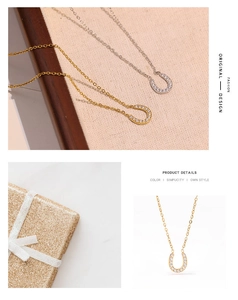 Detail of horseshoe U-shaped necklaces in gold and silver with cubic zirconia inlays