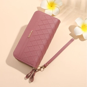 Pink quilted PU leather long wallet with double zippers, wrist strap and floral accents