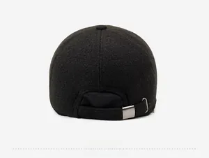 Detail view of the wool baseball cap back showing textured fabric and silver metal buckle