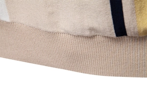 Macro shot of striped knit texture on beige polo shirt with fine ribbed detailing