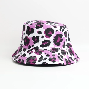 Detail of trendy leopard print bucket hat with purple, black, and white color stitching