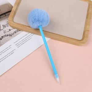 Close-up of light blue pom pom pen with soft plush ball and smooth plastic body