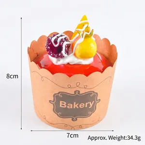 Realistic artificial cupcake model with red glaze and berries for home decor and props