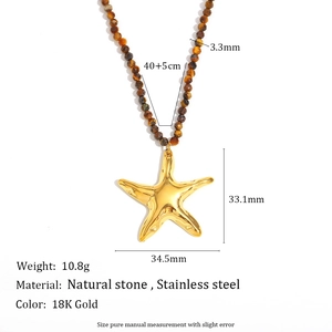 Detail view of 18K gold plated stainless steel starfish pendant with natural stone beads