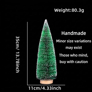 Detail of 35cm mini green cedar tree with white snow flocking and solid wood base