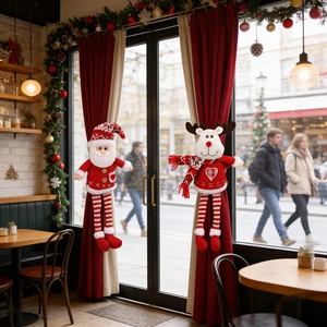 Knitted Santa and Reindeer curtain buckles decoration on red curtains for Christmas