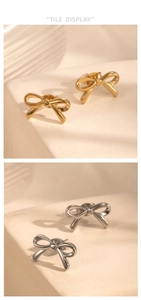Detail view of bow-shaped stainless steel stud earrings in gold and silver finishes