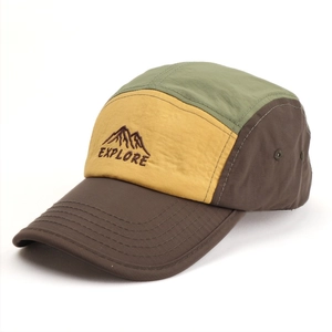 Detail showing high-quality embroidery of mountain and EXPLORE text on five-panel cap