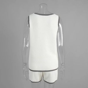 Back view of white waffle knit vest and shorts set with grey contrast trim details