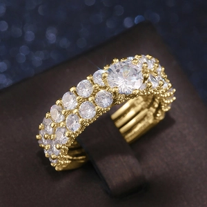 Luxury copper wedding ring set featuring full zircon pavé with a large round main stone