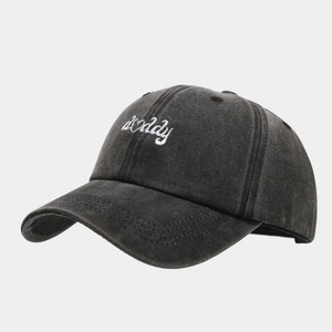 Close-up of daddy embroidery and heart detail on washed cotton retro baseball cap