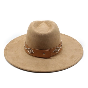 Detail of camel wool wide brim fedora hat with studded leather band and jazz crown shape