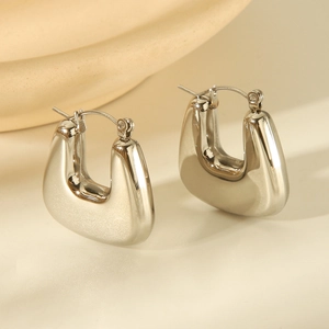 Modern minimalist silver U-shaped thick hoop earrings in polished stainless steel